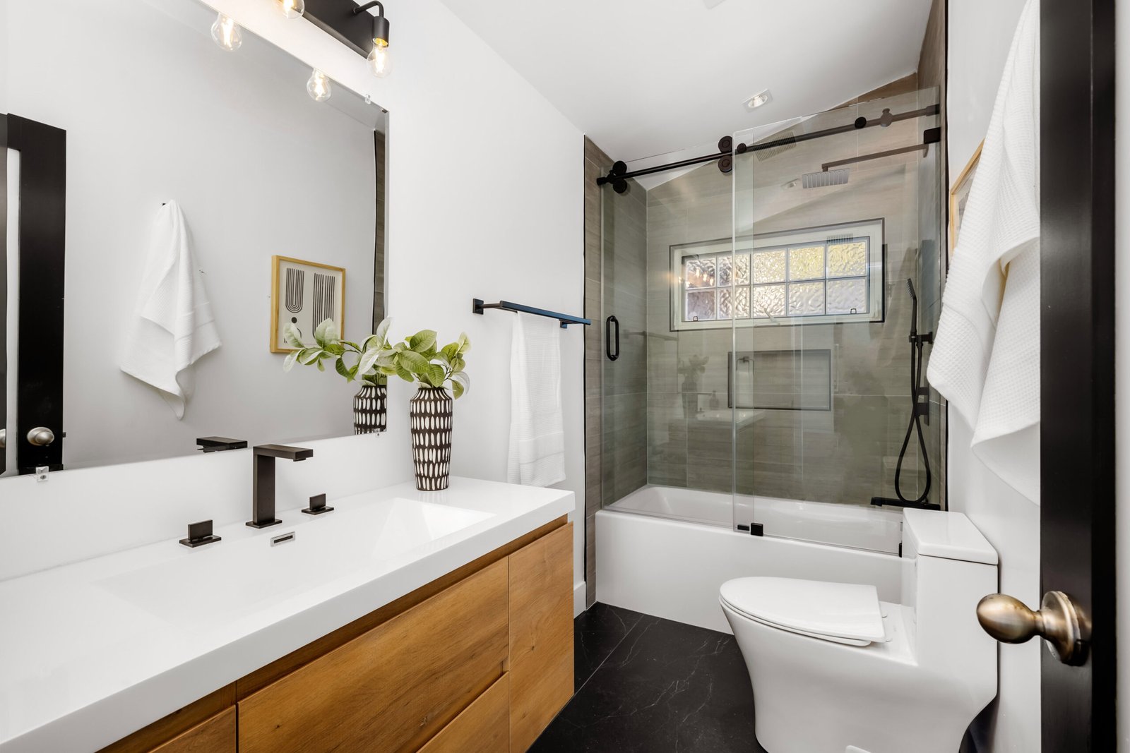 A modern Hollywood Hills home bathroom in Los Angeles, California, with a remodel of an older house