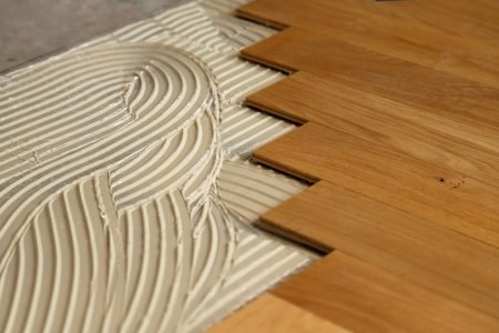 Construction in a renovated room installation of parquet